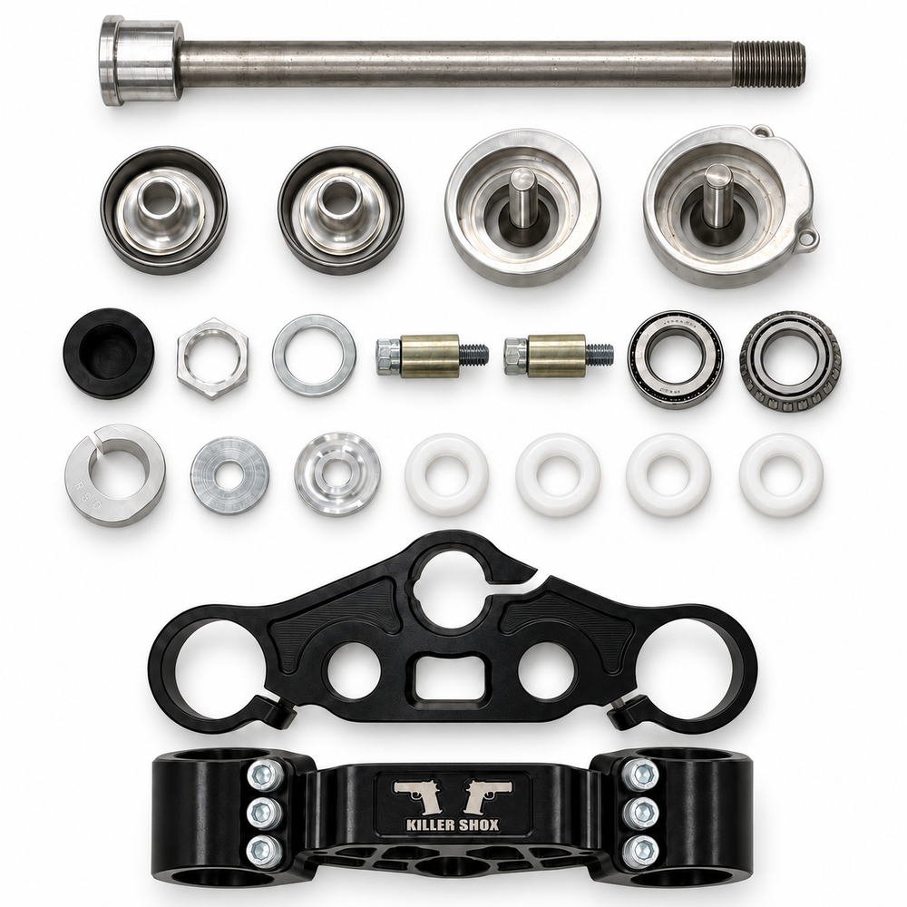 Complete Cheater Tree kit with black clamps, steering stem, bearings and hardware on white