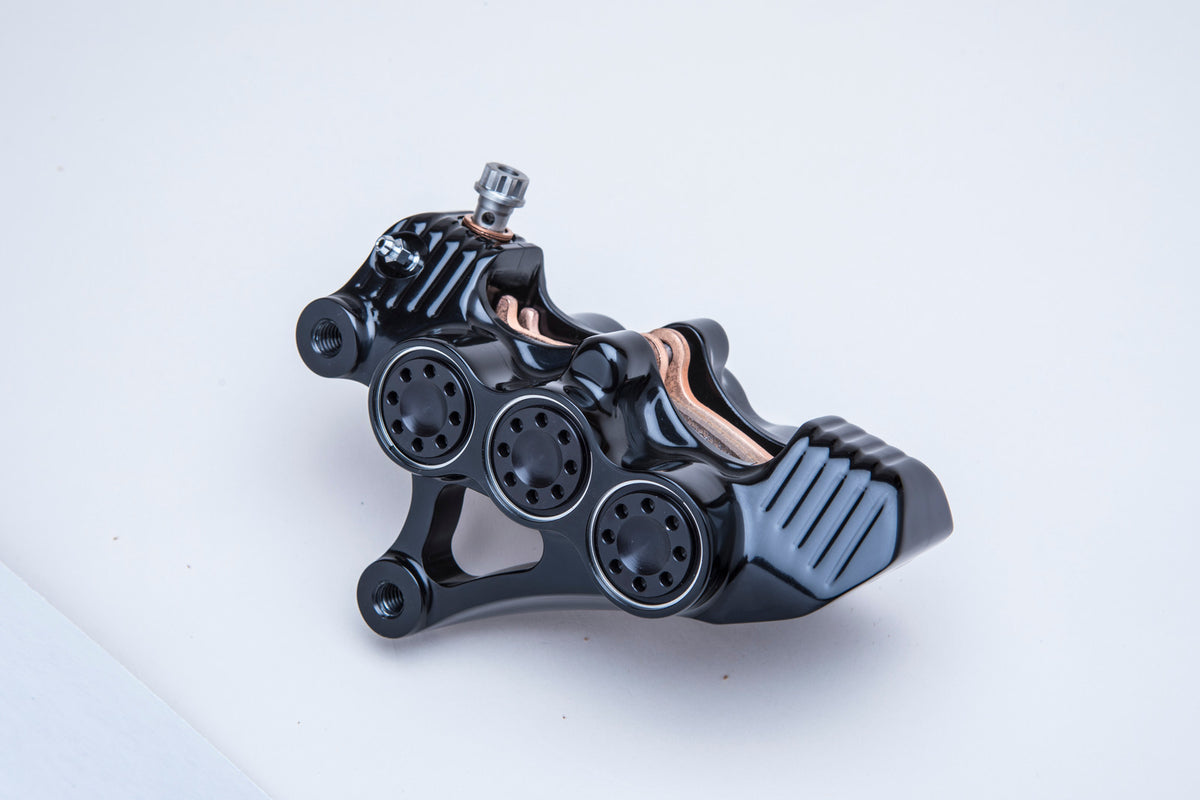 American Suspension B-62 six-piston caliper — black finish